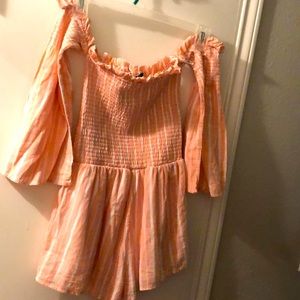 Peach colored romper. Super cute! Just a little small on me now.